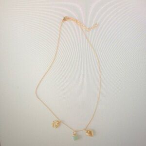 Elegant Gold Necklace with Charms